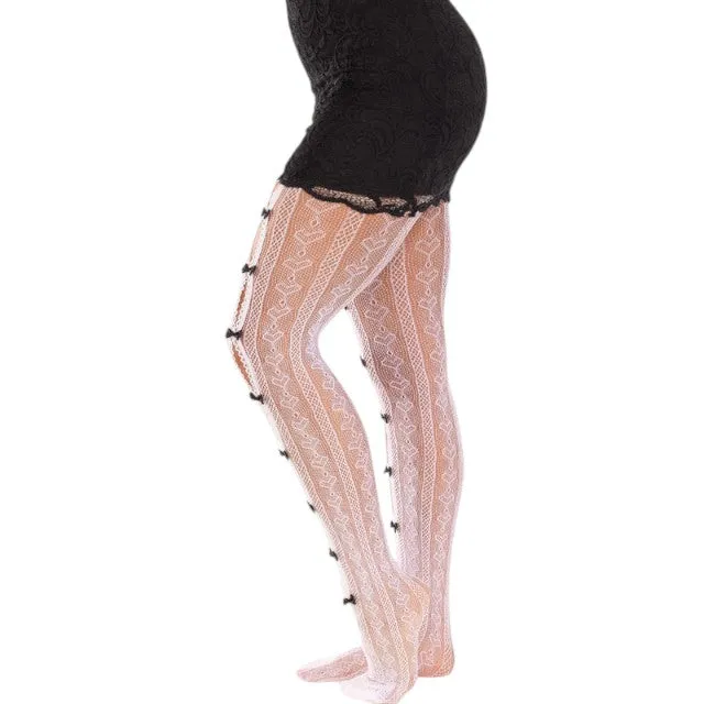 Dresuri LegAvenue - Stockings. cu decupaj si fundite. alb (model 9733)